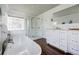 Elegant bathroom featuring soaking tub and glass enclosed shower at 3790 Narmore Ne Dr, Atlanta, GA 30319