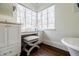 Bright bathroom with a vanity and makeup area with natural light at 3790 Narmore Ne Dr, Atlanta, GA 30319