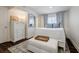 Bedroom features decor in light blues, hardwood flooring, and natural light at 3790 Narmore Ne Dr, Atlanta, GA 30319