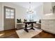 Cozy breakfast nook with built-in bench seating, a round table, and natural light, creating an inviting dining space at 3790 Narmore Ne Dr, Atlanta, GA 30319