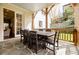 Charming covered patio with an outdoor dining area, perfect for entertaining guests at 3790 Narmore Ne Dr, Atlanta, GA 30319