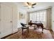 Home office showcasing a classic desk, area rug, and neutral walls, offering a quiet and productive workspace at 3790 Narmore Ne Dr, Atlanta, GA 30319