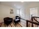 Cozy sitting area with dark armchairs and a view of the game room at 3790 Narmore Ne Dr, Atlanta, GA 30319