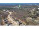 Aerial view of the neighborhood and the house that shows proximity to retail locations at 4296 Alba Ln, Buford, GA 30519