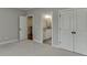 Bright bedroom with attached bathroom and walk-in closet at 4296 Alba Ln, Buford, GA 30519