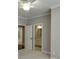 Light filled bedroom opens to bathroom featuring a white door at 4296 Alba Ln, Buford, GA 30519