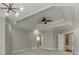 Spacious bedroom featuring decorative ceiling, carpet, and opens to Primary bathroom at 4296 Alba Ln, Buford, GA 30519
