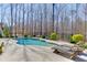 Inviting pool with manicured landscaping, perfect for relaxation and outdoor enjoyment at 4296 Alba Ln, Buford, GA 30519