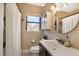 Bathroom featuring a vanity, framed mirror, and combination shower and tub at 708 Argonne Ne Ave # 5, Atlanta, GA 30308