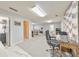 Spacious finished basement with office, gym, and recreational areas featuring great natural light and neutral decor at 1013 Harbor Ct, Woodstock, GA 30189