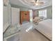 Spacious bedroom with walk in closet and view of ensuite bathroom at 1013 Harbor Ct, Woodstock, GA 30189