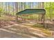 Carport parking area for vehicles at 1013 Harbor Ct, Woodstock, GA 30189