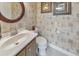 Cozy half bathroom features a custom wall treatment and decor at 1013 Harbor Ct, Woodstock, GA 30189