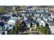 Aerial view of modern homes with dark roofs and light walls, situated in a walkable neighborhood at 155 Breakspear Ln, Fayetteville, GA 30214