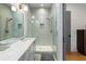Modern bathroom featuring a double vanity sink with marble countertop and glass-enclosed shower with tiled walls at 155 Breakspear Ln, Fayetteville, GA 30214