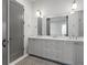 Bright bathroom showcasing a double vanity sink and vanity lighting at 155 Breakspear Ln, Fayetteville, GA 30214