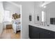 Tastefully designed bathroom features a sleek vanity and a view into the bedroom at 155 Breakspear Ln, Fayetteville, GA 30214