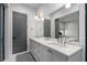 Stylish bathroom with double vanity, marble countertop, and modern finishes at 155 Breakspear Ln, Fayetteville, GA 30214