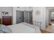 Cozy bedroom has a dresser with a world map hanging on the wall at 155 Breakspear Ln, Fayetteville, GA 30214