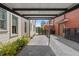 A gravel driveway shaded by a modern metal awning at 155 Breakspear Ln, Fayetteville, GA 30214