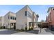 Charming two-story home with modern design, light siding, and covered parking at 155 Breakspear Ln, Fayetteville, GA 30214