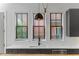 Kitchen featuring stainless steel appliances, modern sink, and gray cabinets at 155 Breakspear Ln, Fayetteville, GA 30214