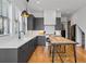 Modern kitchen with dark cabinets, stainless steel appliances, and a central island at 155 Breakspear Ln, Fayetteville, GA 30214