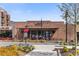 Exterior view of Amici restaurant, featuring an outdoor patio area with seating at 155 Breakspear Ln, Fayetteville, GA 30214