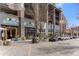 Charming street featuring retail stores, brick buildings, street parking and beautiful landscaping at 155 Breakspear Ln, Fayetteville, GA 30214