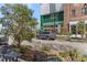 Charming street view with a Fairway Social store, landscaping, tables and chairs, and street parking at 155 Breakspear Ln, Fayetteville, GA 30214