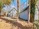 Beautiful backyard with a stone patio and fire pit, offering a perfect outdoor entertainment space at 2466 Thrasher Rd, Buford, GA 30519