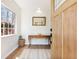 Inviting foyer with natural light, wood floors, and stylish décor at 2466 Thrasher Rd, Buford, GA 30519