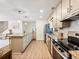 Modern kitchen featuring granite countertops, stainless steel appliances, and a functional layout for culinary enthusiasts at 2466 Thrasher Rd, Buford, GA 30519