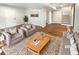 Finished basement with neutral decor, wood-look floors, and cozy seating area at 4095 Kenora Sw Dr, Atlanta, GA 30331