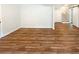 Finished basement with laminate floors and stairs to the first floor at 4095 Kenora Sw Dr, Atlanta, GA 30331