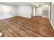 Finished basement featuring wood-look floors and bright white walls at 4095 Kenora Sw Dr, Atlanta, GA 30331