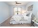 Cozy bedroom featuring neutral tones, soft carpet, and a ceiling fan for a relaxing atmosphere at 821 Ralph Mcgill Ne Blvd # 3209, Atlanta, GA 30306