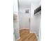 Functional walk-in closet with built-in shelving and hardwood floors, providing ample storage space for clothing and accessories at 821 Ralph Mcgill Ne Blvd # 3209, Atlanta, GA 30306