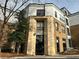 Modern building featuring a blend of beige brick and stucco exterior, accented by black trim and a stylish entrance at 821 Ralph Mcgill Ne Blvd # 3209, Atlanta, GA 30306