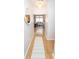 Inviting hallway leading into a living area, featuring beautiful wood floors and a stylish rug at 821 Ralph Mcgill Ne Blvd # 3209, Atlanta, GA 30306
