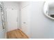 Inviting hallway with wood floors and a decorative mirror for a stylish entryway at 821 Ralph Mcgill Ne Blvd # 3209, Atlanta, GA 30306