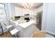 Well-lit kitchen features a breakfast bar, stainless steel appliances, and lots of cabinet space at 821 Ralph Mcgill Ne Blvd # 3209, Atlanta, GA 30306