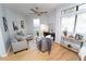 Cozy living room featuring hardwood floors, a ceiling fan, and a comfortable seating arrangement, perfect for relaxation at 821 Ralph Mcgill Ne Blvd # 3209, Atlanta, GA 30306
