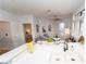 Bright living room with kitchen view featuring wood flooring and modern fixtures at 821 Ralph Mcgill Ne Blvd # 3209, Atlanta, GA 30306