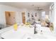 Open-concept living room featuring stylish decor and wood flooring with views of the kitchen at 821 Ralph Mcgill Ne Blvd # 3209, Atlanta, GA 30306