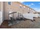 Townhouse backyard with patio, swing, picnic table, grass and white fence at 156 Haven Oak Way, Lawrenceville, GA 30044