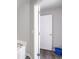 Bathroom doorway features modern grey color scheme, tile flooring, and recessed lighting at 156 Haven Oak Way, Lawrenceville, GA 30044