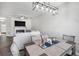 Open floor plan with dining room and view to fireplace at 156 Haven Oak Way, Lawrenceville, GA 30044