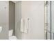 Bathroom with gray walls and white trim features a towel rack with fresh white towels at 2418 Bolling Brook Sw Dr, Atlanta, GA 30311