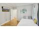 Cozy bedroom features a day bed, TV, and an open doorway at 2418 Bolling Brook Sw Dr, Atlanta, GA 30311